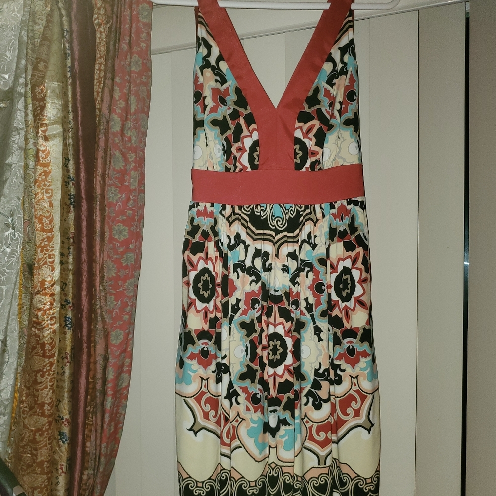 Super cute mini dress. Back bow.